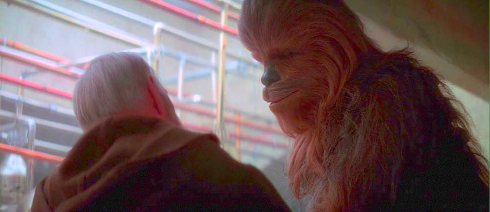 Obi Wan e Chewbacca discutono alla cantina di Mos Eisley