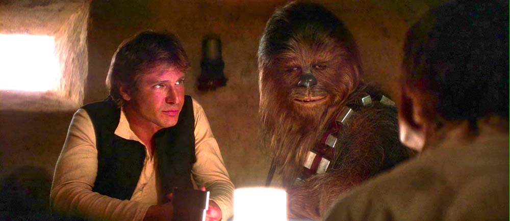 Han Solo e Chewbacca alla cantina di Mos Eisley