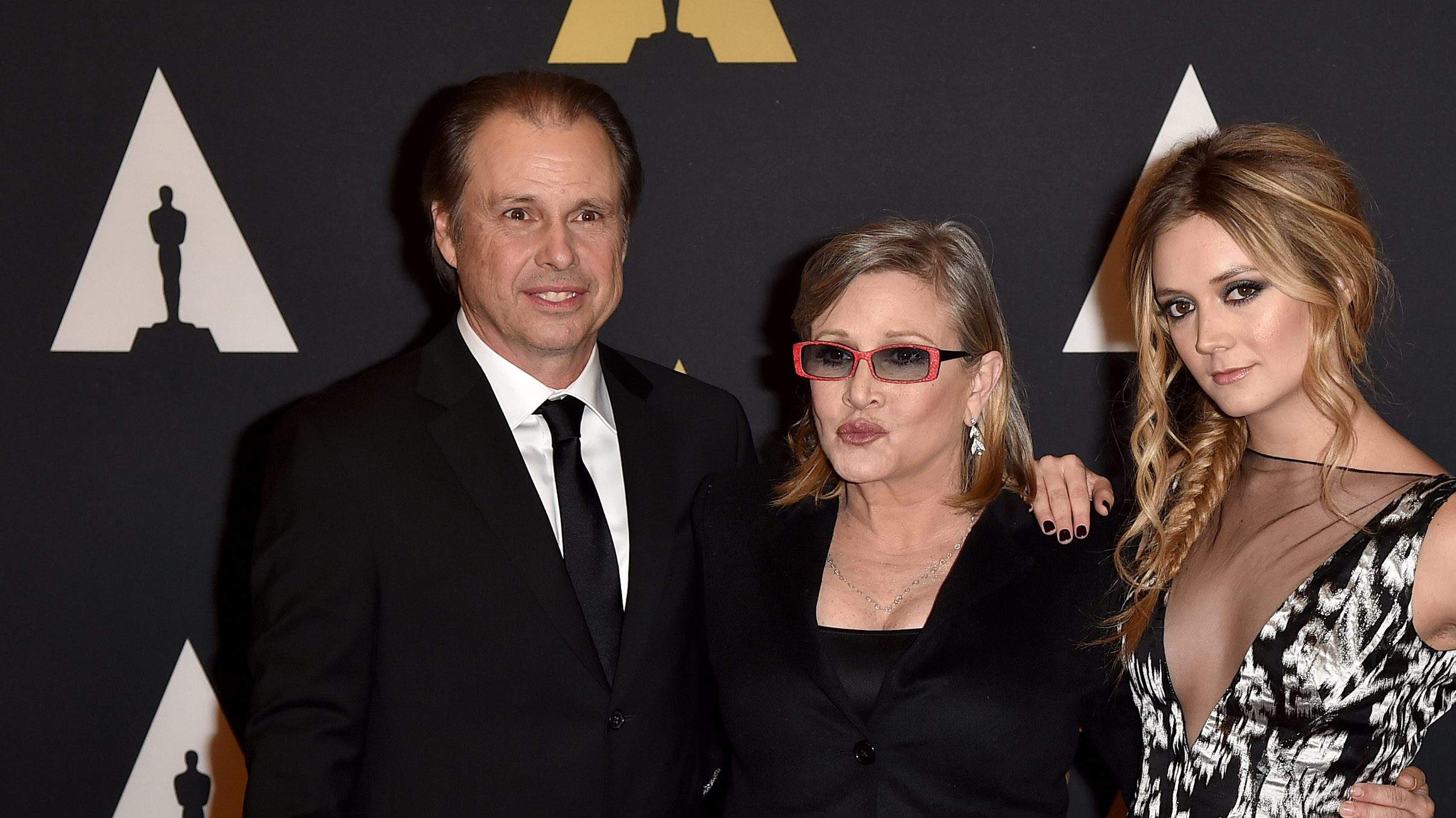 Carrie Fisher con il fratello Todd e la figlia Billie.Da: telegraphmedia