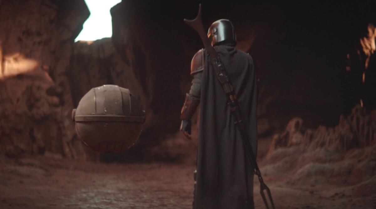 The Mandalorian: analisi del colpo di scena della seconda puntata - Il Mandaloriano e il bambino nella seconda puntata