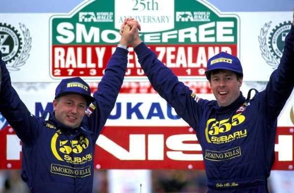 (L-R) Derek Ringer (GBR) and Colin McRae (GBR) Subaru, celebrate on the podium.FIA World Rally Championship, Rd5, Rally of New Zealand, Auckland, New Zealand, 27-30 July 1995.BEST IMAGE