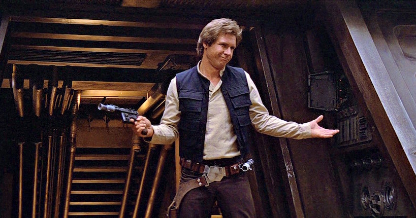 Han Solo con il suo iconico blaster in Episodio VI.Da: konbini