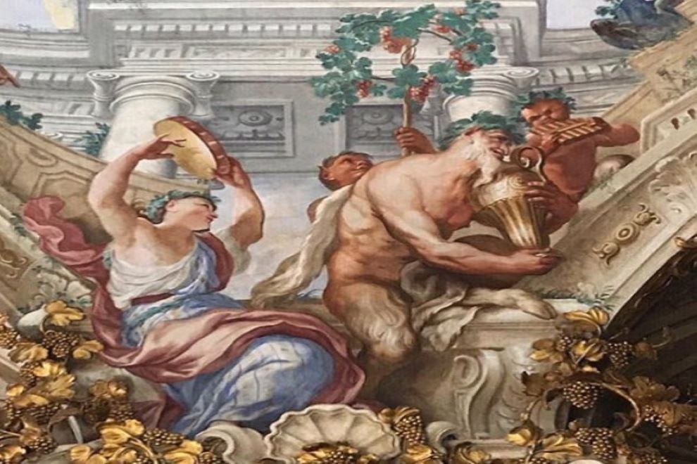 Un dettaglio del trionfo di Bacco, affrescato nella Sala dell'autunno di Palazzo Rosso.