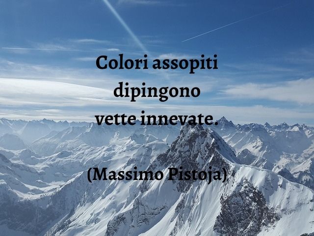 Colori assopiti dipingono vette innevate.(Massimo Pistoja)