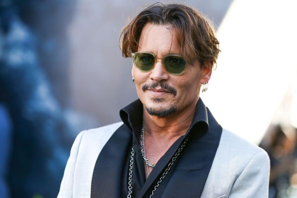 Angoscia e senso di trionfo ne "Il caso Minamata". Bravo Depp - Foto. Elle.com