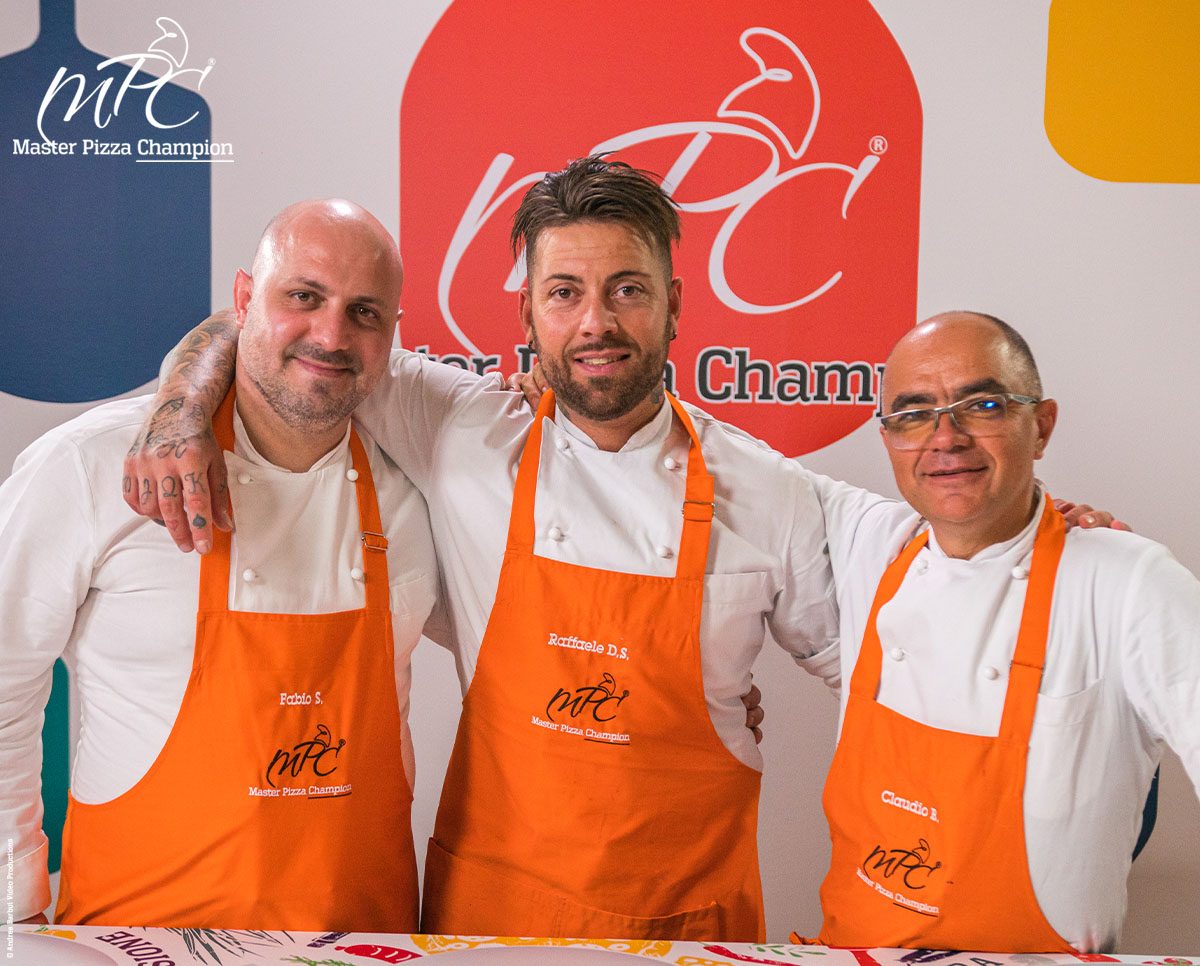 Il vincitore Raffaele Di Stasio con i finalisti Fabio Strazzella (a sinistra) e Claudio Bono (a destra)