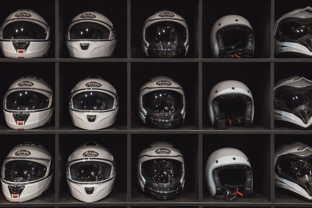 MILAN, ITALY - NOVEMBER 8: Helmets on display at EICMA, international motorcycle exhibition on NOVEMBER 8, 2016 in Milan.