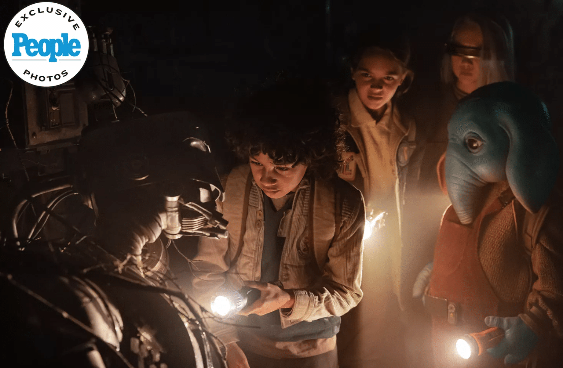 I protagonisti insieme al droide SM-33